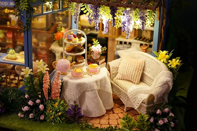Tea table and flowers inside CUTEROOM Rose Tea Garden